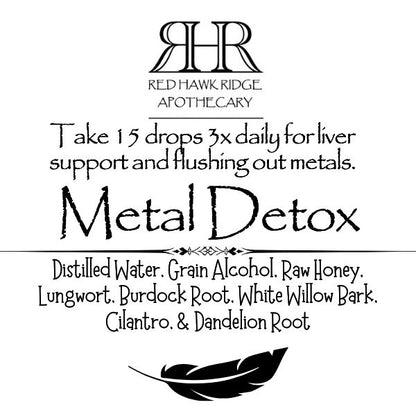 Red Hawk Ridge Apothecary Metal Detox product label with text and logo.