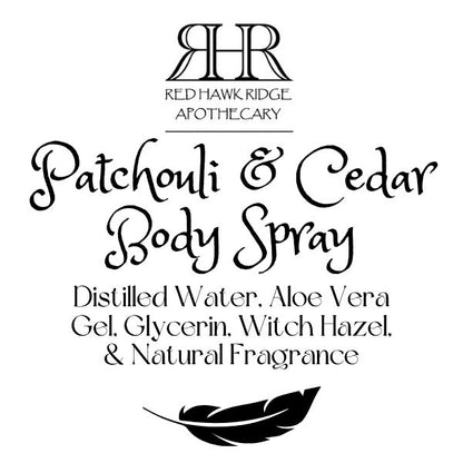 Red Hawk Ridge Apothecary Patchouli & Cedar Body Spray label with feather design.