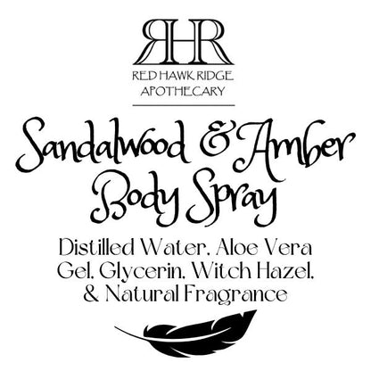 Red Hawk Ridge Apothecary Sandalwood & Amber Body Spray label with feather design.